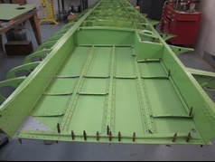 Inside a cessna wing being repaired and
                      skinned by RJ Dauhn Aircraft